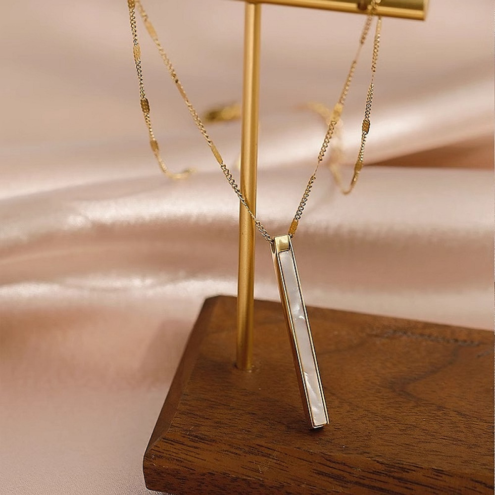 Цепь с подвеской с белым перламутром из ювелирной стали с золотым покрытием 750 пробы фото-6 Цепь с подвеской с белым перламутром из ювелирной стали с золотым покрытием 750 пробы фото-6